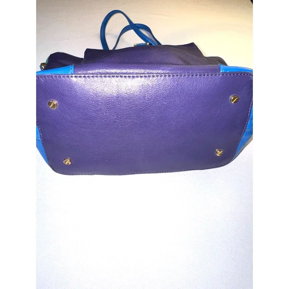Tory Burch Blue, Purple, Green Color Blocked leather purse.